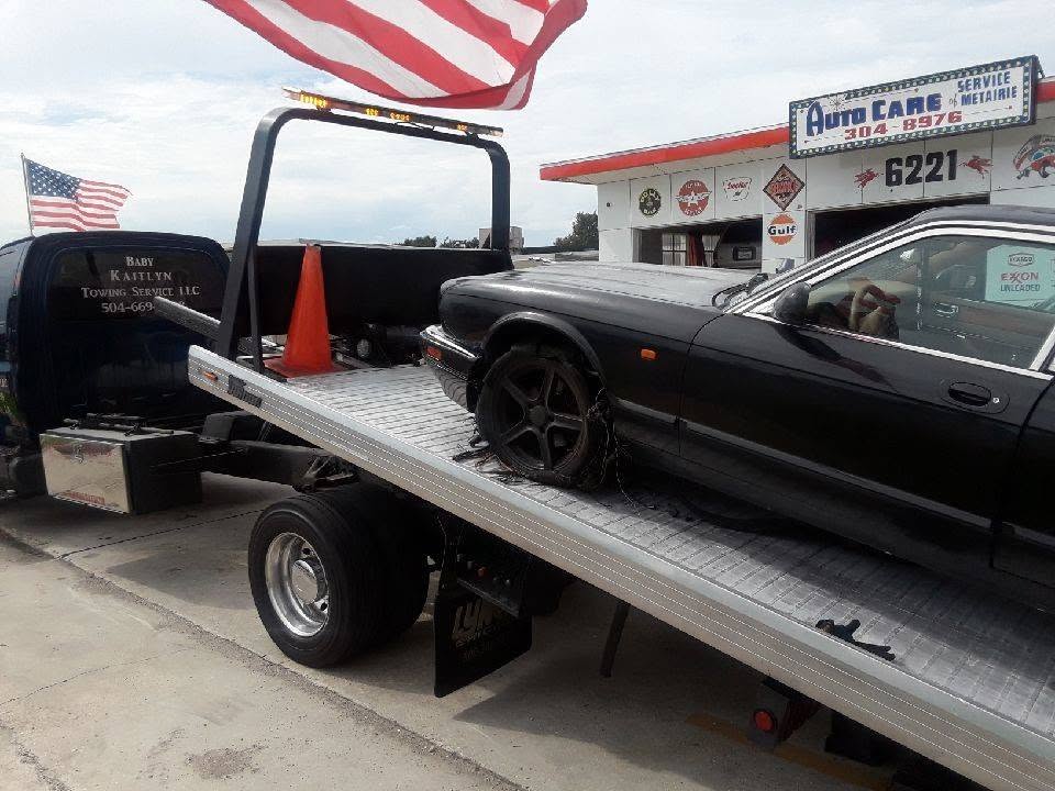 Baby Kaitlyn Towing flatbed truck black bmw on bed
