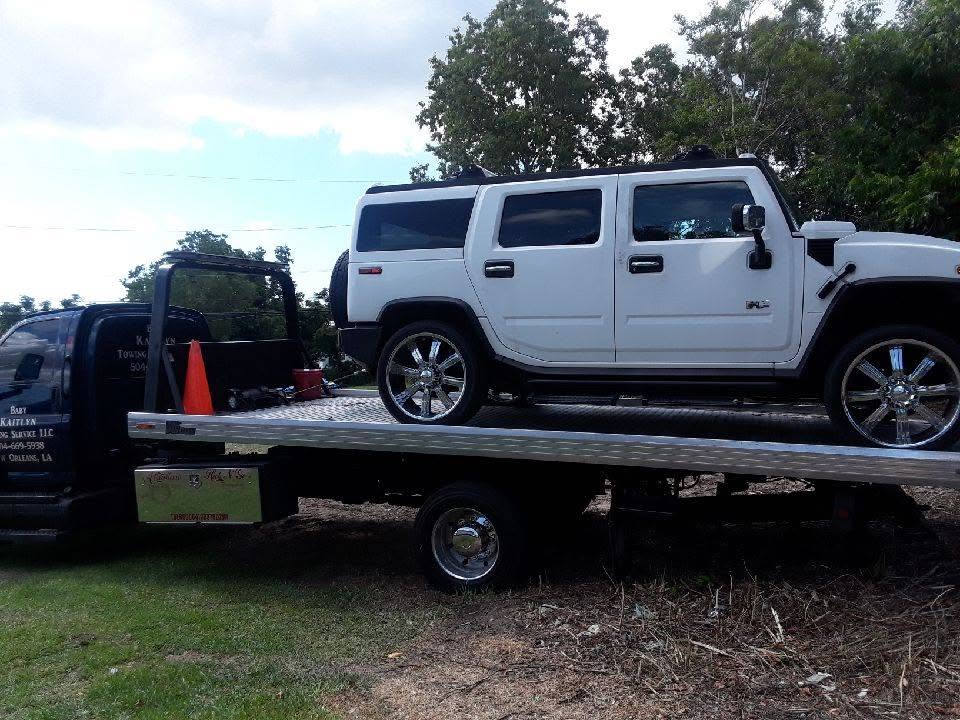 Baby Kaitlyn Flatbed with Hummer on bed.